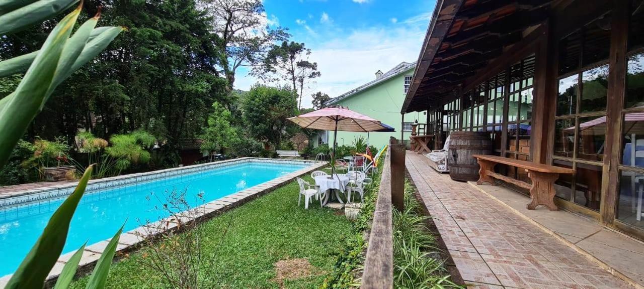 Pousadinha La Em Casa Homestay *