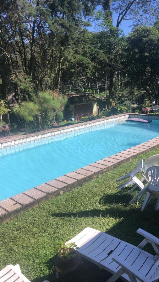 Pousadinha La Em Casa Homestay